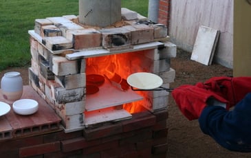 Cuisson au four à bois et vente de la production